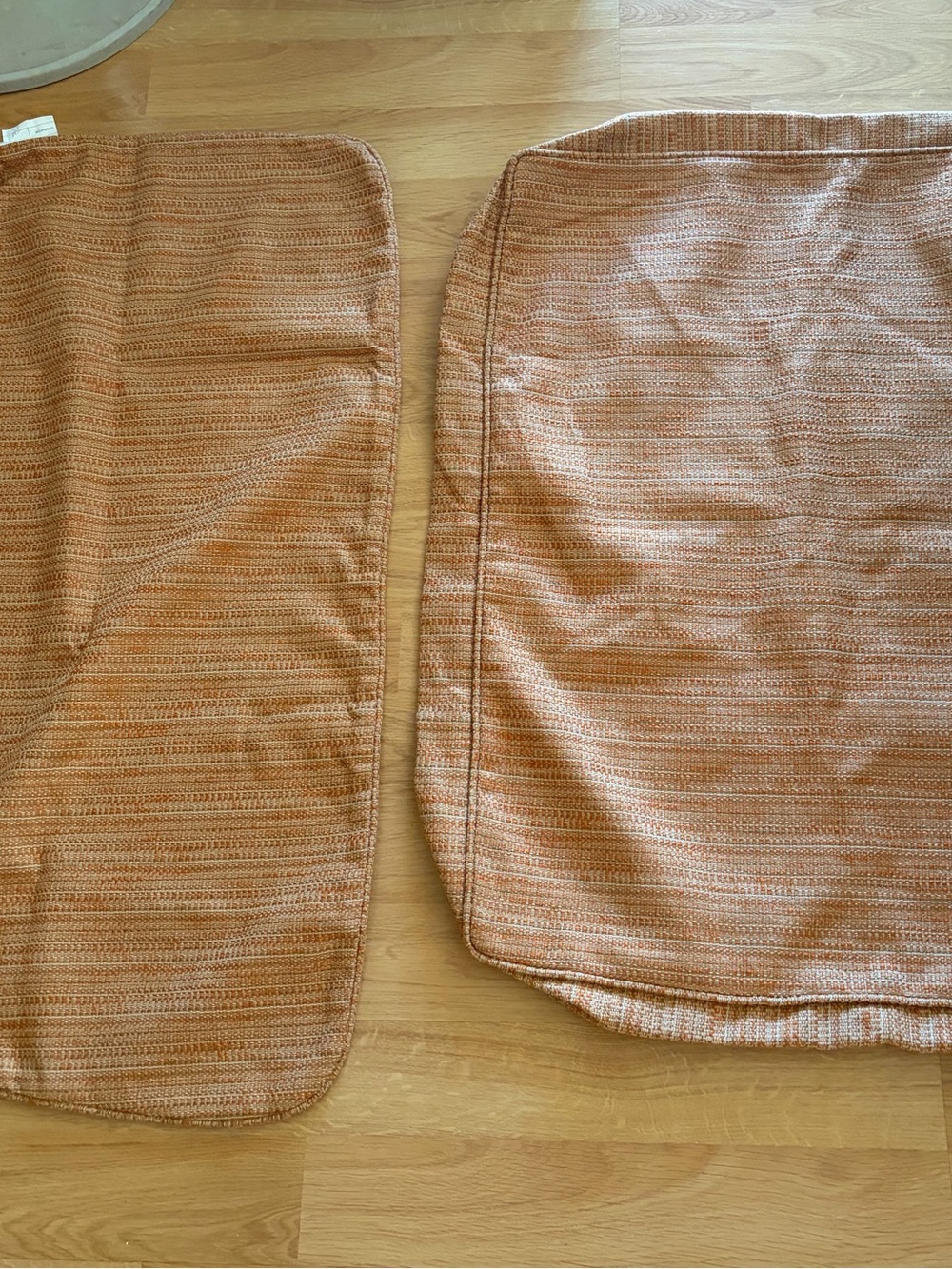 Cushion covers orange and tan